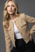 Women's cropped blazer featuring elegant tweed design and gold buttons, round neck, and tailored fit for a sophisticated look. 5