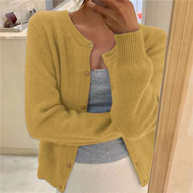 Women's cropped cardigan in white with button front, featuring a soft knit fabric and relaxed fit, perfect for layering in any season. 5