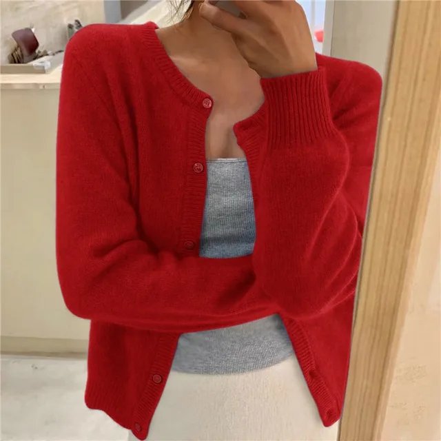 Women's cropped cardigan in white with button front, featuring a soft knit fabric and relaxed fit, perfect for layering in any season. 7
