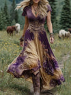 Women's floral maxi dress featuring a v-neck and short sleeves, designed with an elegant purple and blue print, perfect for summer events. 3