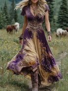 Women's floral maxi dress featuring a v-neck and short sleeves, designed with an elegant purple and blue print, perfect for summer events. 3