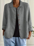 Women's lightweight button front jacket designed for casual summer wear, featuring a comfortable loose fit and minimalist style in soft, breathable fabric. 6