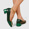 Women's croc-embossed patent leather loafers with block heel and stylish chain detail in a glossy finish. 2