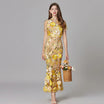 Elegant women's maxi dress featuring 3D floral appliques, sleeveless design, and a floor-length silhouette in vibrant yellow and white colors. 0