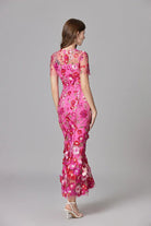 Elegant women's maxi dress featuring 3D floral appliques, sleeveless design, and a floor-length silhouette in vibrant yellow and white colors. 6