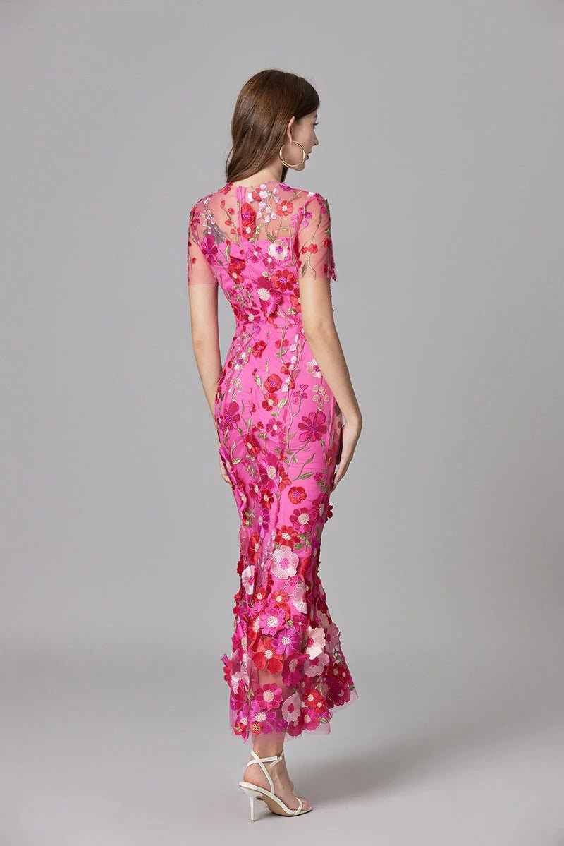 Elegant women's maxi dress featuring 3D floral appliques, sleeveless design, and a floor-length silhouette in vibrant yellow and white colors. 6