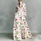 Women's maxi dress featuring long sleeves and a stylish geometric print, designed with a high-waist button-front and convenient pockets for a chic and comfortable look. 5