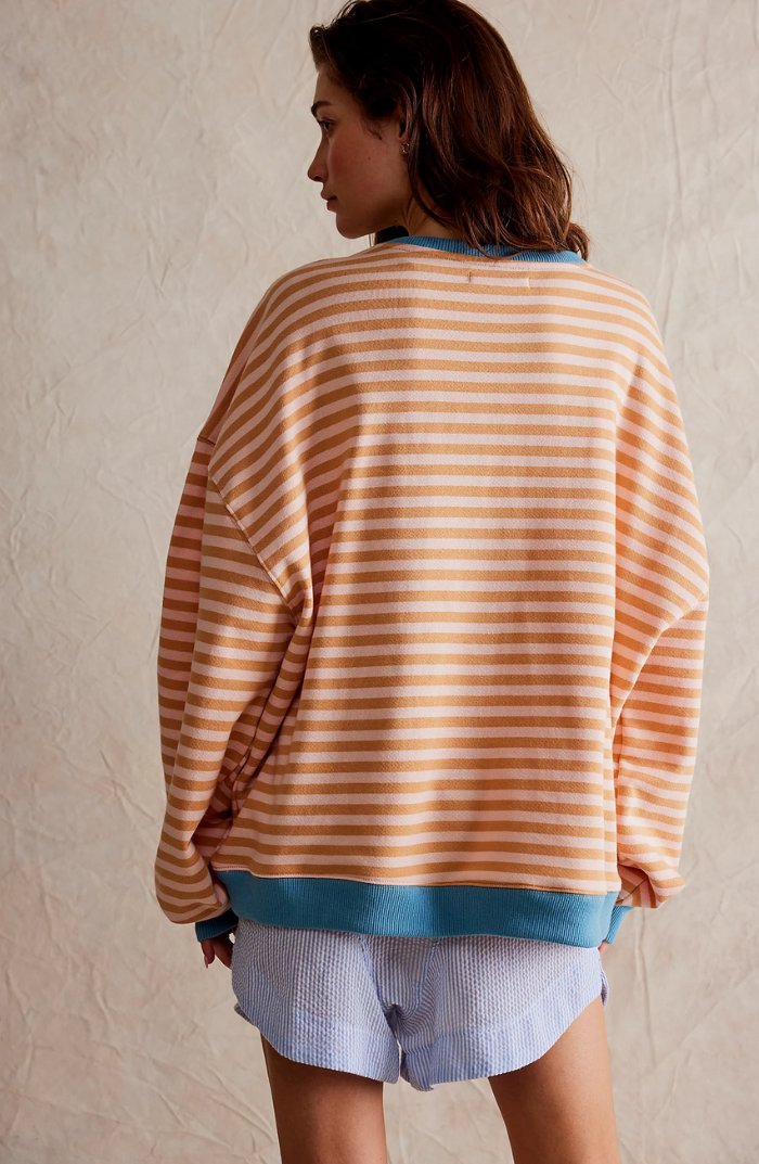 Women's oversized sweatshirt featuring neon contrast trim, striped drop-shoulder design, and made from lightweight knit fabric, perfect for casual and comfortable wear. 7