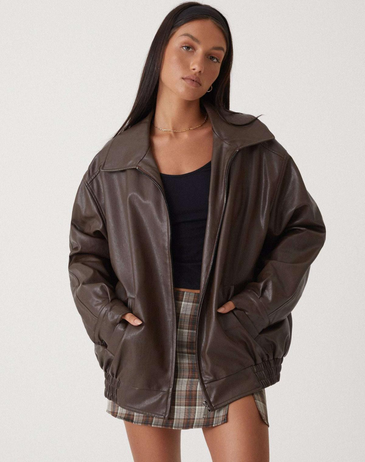 Casual brown oversized women's PU leather jacket, stylish faux leather outerwear for a trendy look. 0