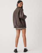 Casual brown oversized women's PU leather jacket, stylish faux leather outerwear for a trendy look. 3
