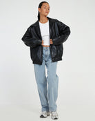 Casual brown oversized women's PU leather jacket, stylish faux leather outerwear for a trendy look. 4