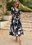 Women’s Printed Midi Dress with V-neck and Puff Sleeves