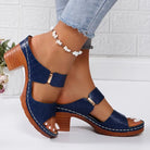 Women's brown sandals featuring a cushioned footbed and stylish block heel, crafted from woven synthetic leather for comfort and durability. 7