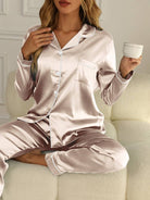 Women's Satin Pajama Set featuring a stylish button-up blouse and long trousers, perfect for a comfortable and elegant sleepwear experience. 10