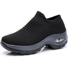 Women's slip-on sneakers featuring air cushion technology and a breathable knit design, perfect for all-day comfort and stylish casual wear. 0