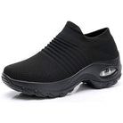 Women's slip-on sneakers featuring air cushion technology and a breathable knit design, perfect for all-day comfort and stylish casual wear. 2