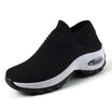 Women's slip-on sneakers featuring air cushion technology and a breathable knit design, perfect for all-day comfort and stylish casual wear. 3