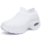 Women's slip-on sneakers featuring air cushion technology and a breathable knit design, perfect for all-day comfort and stylish casual wear. 4