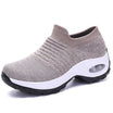 Women's slip-on sneakers featuring air cushion technology and a breathable knit design, perfect for all-day comfort and stylish casual wear. 5