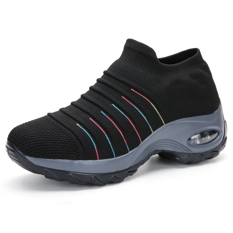 Women's slip-on sneakers featuring air cushion technology and a breathable knit design, perfect for all-day comfort and stylish casual wear. 7
