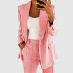 Elegant women's suit featuring a tailored blazer and high-waist trousers, perfect for office wear, showcasing a sophisticated design in a chic color palette. 2