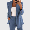 Elegant women's suit featuring a tailored blazer and high-waist trousers, perfect for office wear, showcasing a sophisticated design in a chic color palette. 4