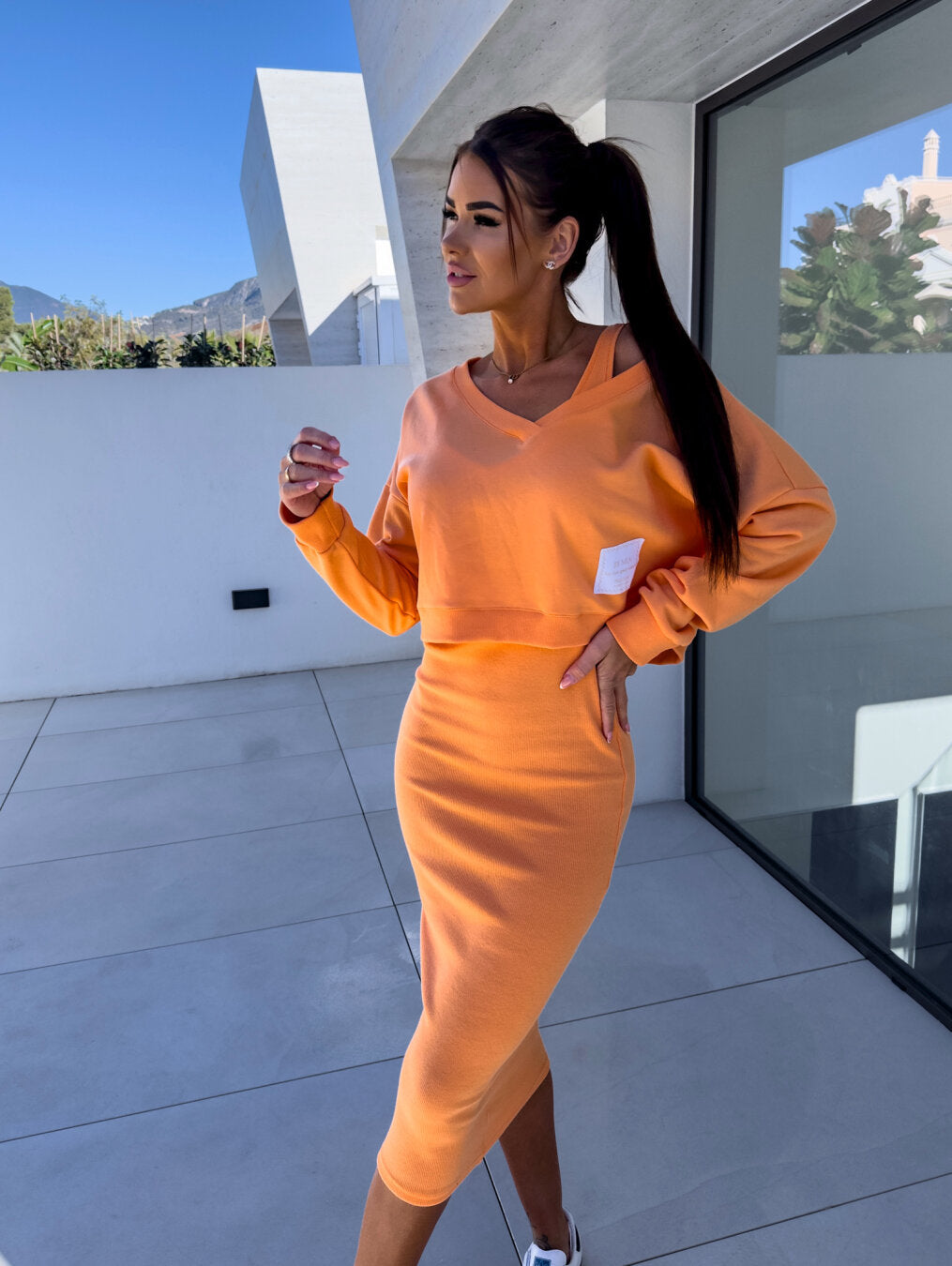 Women's two piece set featuring a chic midi dress paired with a cozy sweatshirt, perfect for versatile styling and comfortable wear. 0