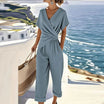 Women's V-Neck Jumpsuit featuring flattering wrap details, designed for casual summer style with short sleeves and a comfortable fit. 1